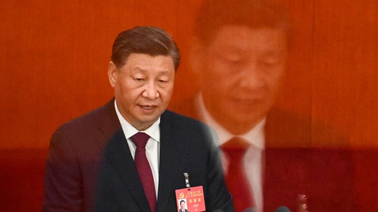 NOEL CELIS (FILES) In this file photo taken on October 16, 2022, China's President Xi Jinping speaks during the opening session of the 20th Chinese Communist Party's Congress at the Great Hall of the People in Beijing. - Xi Jinping secured a historic third term as China's leader on October 23, 2022 and promoted some of his closest Communist Party allies, cementing his position as the nation's most powerful leader since Mao Zedong. (Photo by Noel CELIS / AFP)
