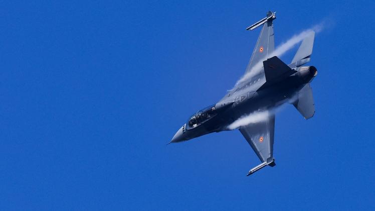A Belgian F-16 jet fighter takes part in the NATO Air Nuclear drill "Steadfast Noon" (its regular nuclear deterrence exercise) at the Kleine-Brogel air base in Belgium on October 18, 2022. - NATO on October 17, 2022 launched its regular nuclear deterrence drills in western Europe, after tensions soared with Russia over President Vladimir Putin&apos;s veiled threats in the face of setbacks in Ukraine. The 30-nation alliance has stressed that the "routine, recurring training activity" -- which runs until October 30 -- was planned before Moscow invaded Ukraine and is not linked to the current situation. (Photo by Kenzo TRIBOUILLARD / AFP)