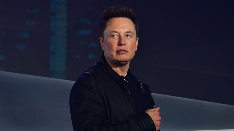 (FILES) In this file photo taken on November 21, 2019 Tesla co-founder and CEO Elon Musk introduces the newly unveiled all-electric battery-powered Tesla Cybertruck at Tesla Design Center in Hawthorne, California. - Elon Musk took control of Twitter and fired its top executives, US media reported late October 27, 2022, in a deal that puts one of the top platforms for global discourse in the hands of the world's richest man. Musk sacked chief executive Parag Agrawal, as well as the company's chief financial officer and its head of legal policy, trust and safety, the Washington Post and CNBC reported citing unnamed sources. (Photo by Frederic J. BROWN / AFP)