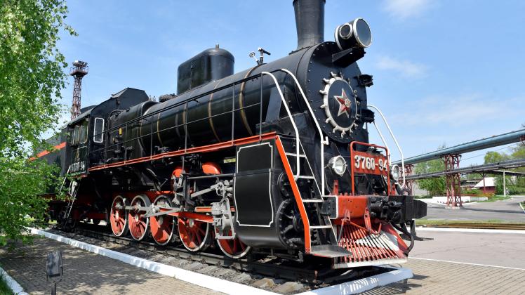 DONETSK REGION, UKRAINE   MAY 5, 2022: A steam locomotive on display at Branch No.4 of Makeyevkoks Plant, a subsidiary o