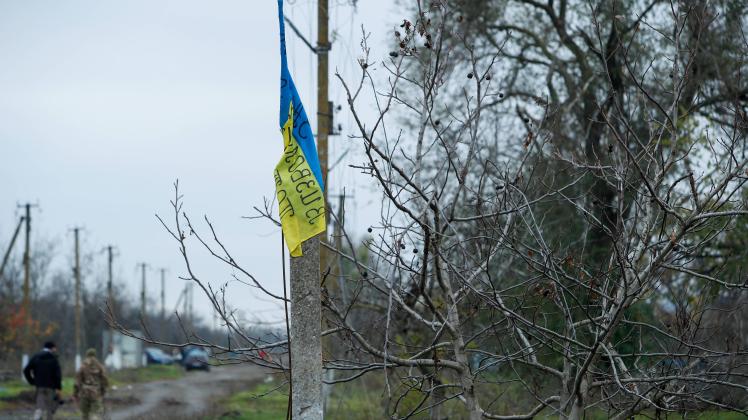 November 8, 2022, Kherson Oblast, Kherson Oblast, Ukraine: A Ukrainian national flag is seen at a village in Kherson Ob
