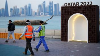 Mandatory Credit: Photo by Javier Garcia/Shutterstock (13622599dx) Construction workers and tourists near the fan zone w