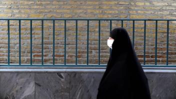 December 3, 2022, Tehran, Tehran, Iran: An Iranian veiled woman walks around in the old main bazaar of Tehran, Iran, on