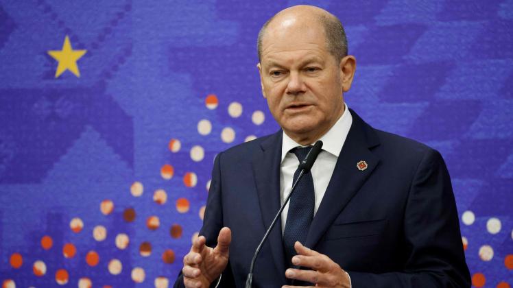German Chancellor Olaf Scholz addresses journalists during a press conference following the EU Western Balkans summit in Tirana on December 6, 2022. - European Union and Balkan leaders meet in Tirana to discuss tighter ties as Russia&apos;s invasion of Ukraine has reinvigorated the bloc&apos;s push for expansion. The summit, which includes Albania, Bosnia, Montenegro, Kosovo, North Macedonia and Serbia, is set to focus on concrete cooperation issues. (Photo by Ludovic MARIN / AFP)
