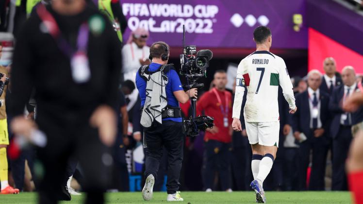 (221210) -- DOHA, Dec. 10, 2022 -- Cristiano Ronaldo of Portugal leaves the pitch after they lost the Quarterfinal betw