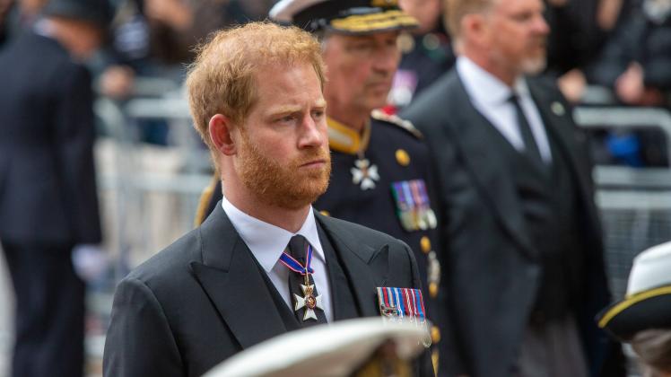 September 19, 2022, London, England, United Kingdom: Prince HARRY is seen following the coffin of Queen Elizabeth II, dr