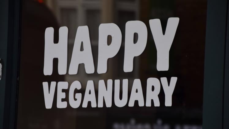 January 4, 2023, London, England, United Kingdom: Happy Veganuary sign at a restaurant in London. Veganuary is a campaig