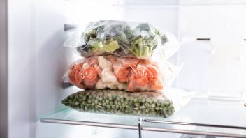Plastic Bags With Frozen Vegetables In Refrigerator Copyright: xAndreyPopovx Panthermedia26896484