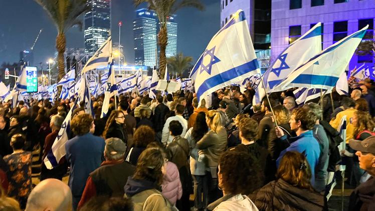 ISRAEL, TEL AVIV - JANUARY 28, 2023: Protesters take part in an anti-government demonstration near government buildings 