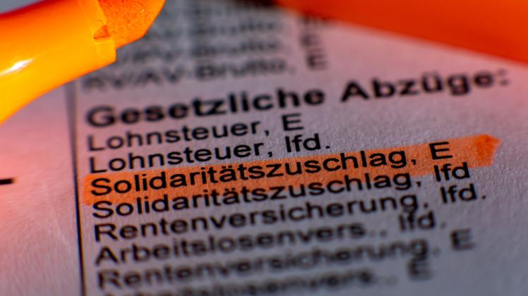 SPD fordert weiter früheren Soli-Abbau - Bundesbank dafür