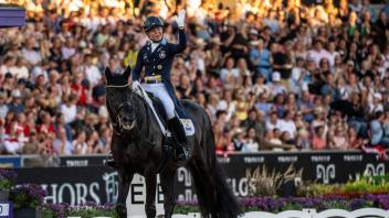 220810 Therese Nilshagen of Sweden with horse Dante Weltino competes during the Individual Grand Prix Freestyle on day