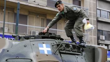 March 25, 2015 - Athens, Attica, Greece - A soldier puts the last thing into a Leopard 1 Main Battle Tank ahead of the m