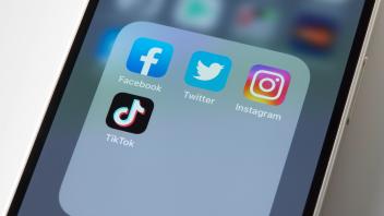 The logos of mobile apps Facebook, Twitter, Instagram and TikTok, are displayed on a screen in Tokyo, Japan, August 3, 2