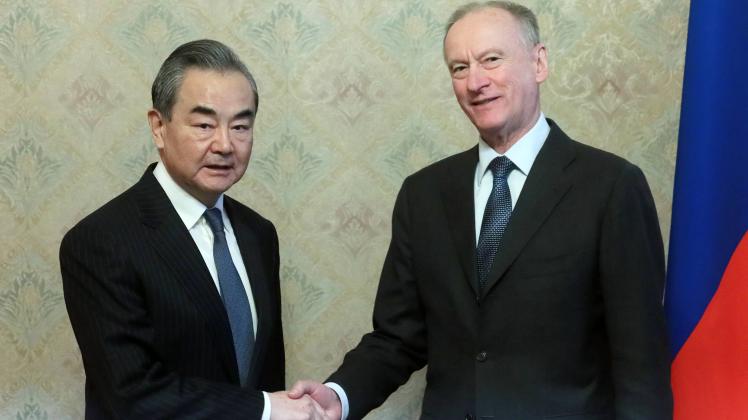Russia China 8375048 21.02.2023 Russian Security Council Secretary Nikolai Patrushev, right, and Chinese Central Foreign