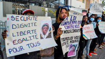 March 21, 2023, Tunis, Tunisia: Tunis, Tunisia. 21 March 2023. Sub-Saharan Africans hold a vigil outside the UNHCR headq