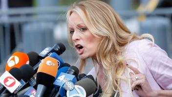 (FILES) In this file photo taken on April 16, 2018, adult film actress Stephanie Clifford, also known as Stormy Daniels speaks US Federal Court in Lower Manhattan, New York. - Stormy Daniels is a onetime porn star who has approached her growing role in US political history with character and wit -- though her feud with Donald Trump has come with a price.The adult film actress has done battle with the former president for several years, alleging in 2018 that the two had a sexual relationship the long-ago summer of 2006. (Photo by EDUARDO MUNOZ ALVAREZ / AFP)