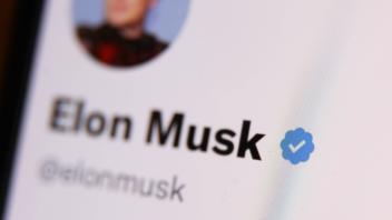 Twitter And Elon Musk Photo Illustrations The blue checkmark on Elon Musk account on Twitter is seen displayed on a phon