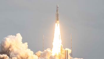 This photograph taken on April 14, 2023, shows Arianespace&apos;s Ariane 5 rocket lifting off from its launchpad, at the Guiana Space Center in Kourou, French Guiana. - The European Space Agency&apos;s JUICE mission to explore Jupiter&apos;s icy, ocean-bearing moons will again try to blast off on April 14, 2023, a day after the first launch attempt was called off due to the threat of lightning. (Photo by jody amiet / AFP)