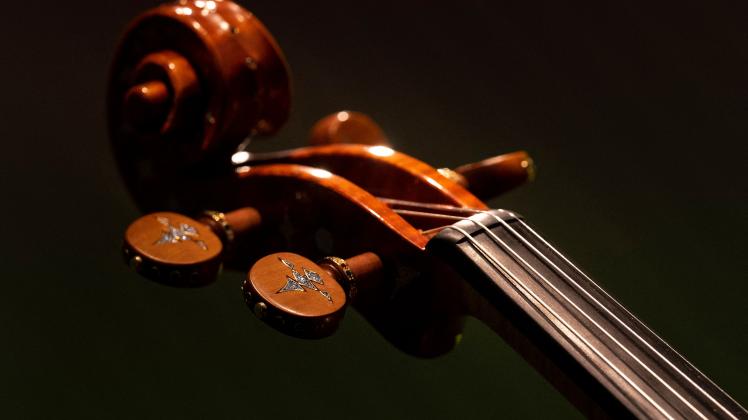 A detail of the world's most precious violin, The Osmium violin, created by Austrian violin maker Edgar Rus is seen in Vienna, Austria on March 30, 2023. - The Osmium violin, appraised to 3,5 million Euros, was made with osmium and hundreds of precious gemstones including diamonds. (Photo by JOE KLAMAR / AFP)