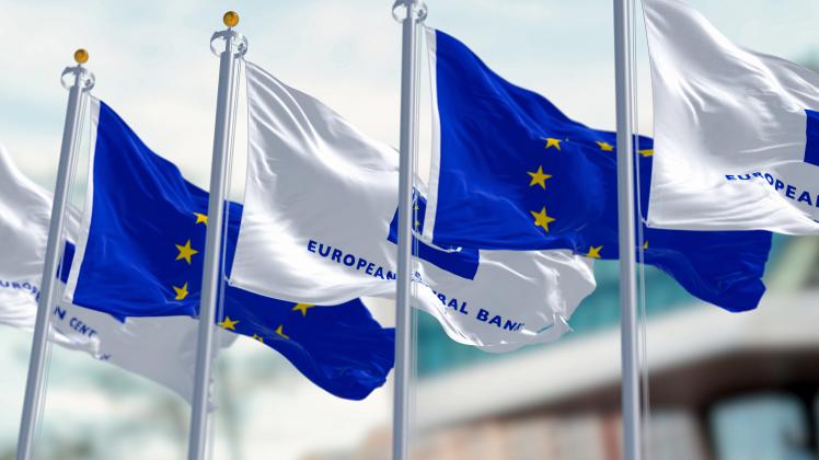 Flags of ECB and EU waving with the European Central Bank seat blurred in background, Frankfurt, DE, March 2023: Five Fl
