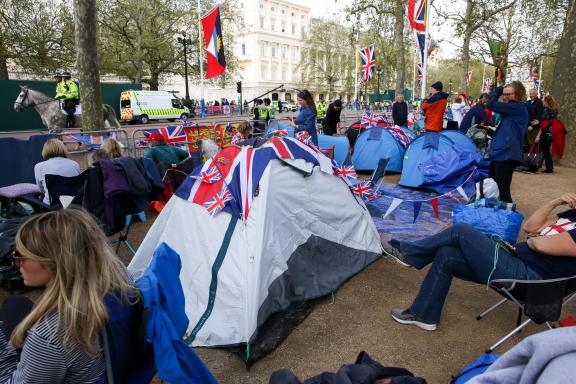 May 5, 2023, London, United Kingdom: Royal supporters with their tents along the Mall in central London on the eve of th