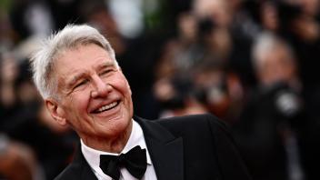 US actor Harrison Ford arrives for the screening of the film "Indiana Jones and the Dial of Destiny" during the 76th edition of the Cannes Film Festival in Cannes, southern France, on May 18, 2023. (Photo by LOIC VENANCE / AFP)