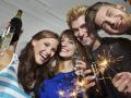 Germany Berlin Group of young people waving sparklers model released property released PUBLICATION