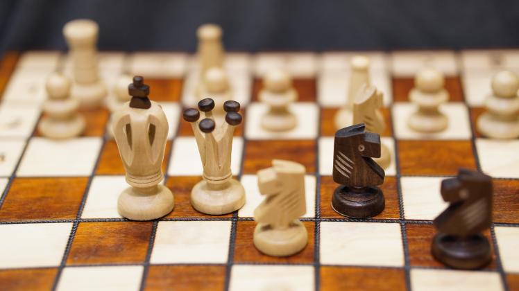 RECORD DATE NOT STATED A closeup shot of a chessboard with the focus on a white s queen, king and black s knight *** ein