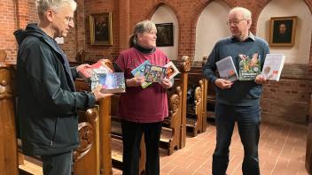 Thomas Robatzek von der evangelischen Gemeinde, Claudia Kaltenbach und Nikolaus Rawald von der katholischen Gemeinde (vl)