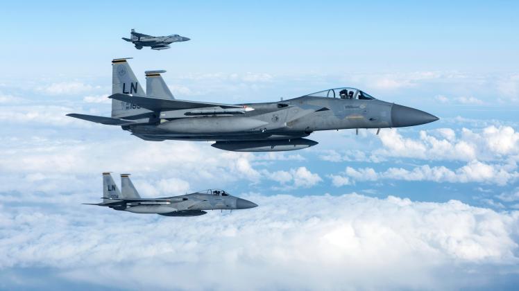 STYLELOCATIONU.S. Air Force F-15C Eagle fighter aircraft, assigned to the 493rd Fighter Squadron, return to Royal Air Fo