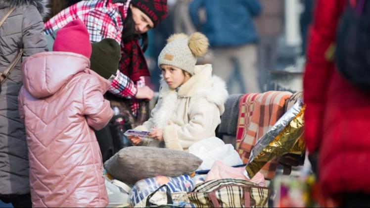 Flüchtlinge aus der Ukraine an der polnischen Grenze