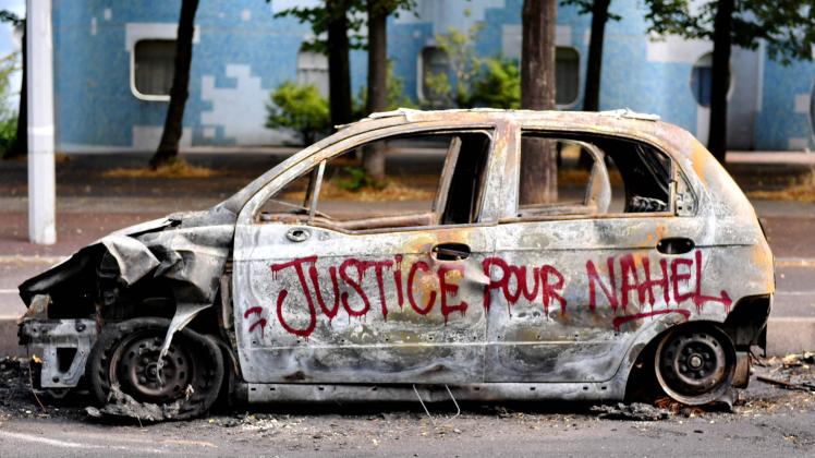 Riots Aftermath - Nanterre Burned vehicles, vandalized stores by protesters are seen in Nanterre, Paris outskirts, Franc