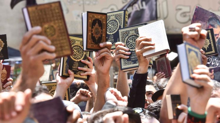 RECORD DATE NOT STATED Protest Against Quran Burning In Beirut, Lebanon People raise copies of the Koran as they partici