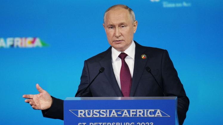 This pool image distributed by Sputnik agency shows Russian President Vladimir Putin giving a speech during the plenary session of the second Russia-Africa summit in Saint Petersburg on July 27, 2023. (Photo by Alexey DANICHEV / POOL / AFP)