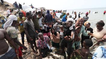 (230728) -- RAS AJDIR, July 28, 2023 -- African migrants are seen at the Libya-Tunisia border in Ras Ajdir, Libya, on Ju