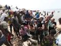 (230728) -- RAS AJDIR, July 28, 2023 -- African migrants are seen at the Libya-Tunisia border in Ras Ajdir, Libya, on Ju