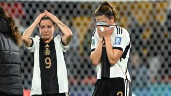 WWC23 KOREA GERMANY, Svenja Huth (left) and Chantal Hagel (right) of Germany react following their 1 all draw eliminatin