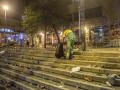 August 20, 2021, Barcelona, Catalonia, Spain: A worker is seen collecting rubbish after the police officer dispersing cr