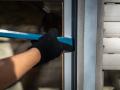 Augsburg, Bavaria, Germany - August 7, 2023: Symbol image burglary in the apartment, apartment burglary. Masked burglar 
