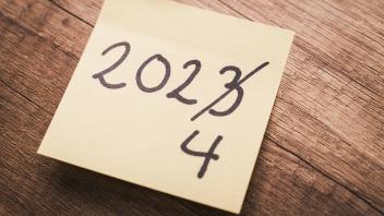 3 July 2023: Year change concept from 2023 to 2024. Note sheet with the number 2023 crossed out. New Year s Eve and New 