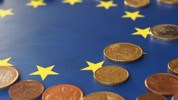 euro coins over european union flag background Model Released Property Released xkwx background bank