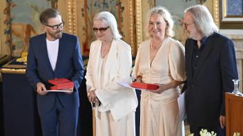 The music group ABBA with Björn Ulvaeus, Anni-Frid Lyngstad, Agnetha Fältskog and Benny Andersson are given the Royal Vasa Order from Sweden&apos;s King and Queen during a ceremony at Stockholm Royal Palace on May 31, 2024 for outstanding contributions to Swedish and international music life. (Photo by Henrik Montgomery/TT / TT News Agency / AFP) / Sweden OUT
