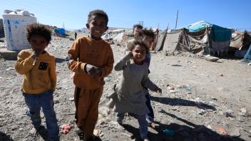 November 25, 2023, Sanaa, Sanaa, Yemen: Yemeni children stand at a makeshift camp for Internally Displaced Persons in th