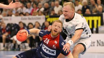 Foto : am Ball Jim Gottfridsson (Flensburg) gegen Patrick Wiencek (Kiel) Handball Herren 1. Bundesliga am Sa. 23.03.2024