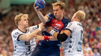 Handball Bundesliga Saison 2023/24 - SG Flensburg-Handewitt gegen THW Kiel.  Eric Johansson, Simon Pytlick und Patrick Wiencek - 07.09..2023 - Foto Marcus Dewanger